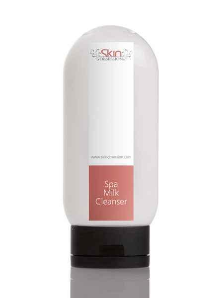 Bottle of Spa Milk Facial Cleanser for sensitive skin with hydrating and nourishing formula on white background